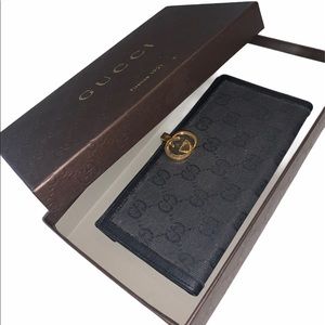 Authentic Gucci monogram wallet/check book